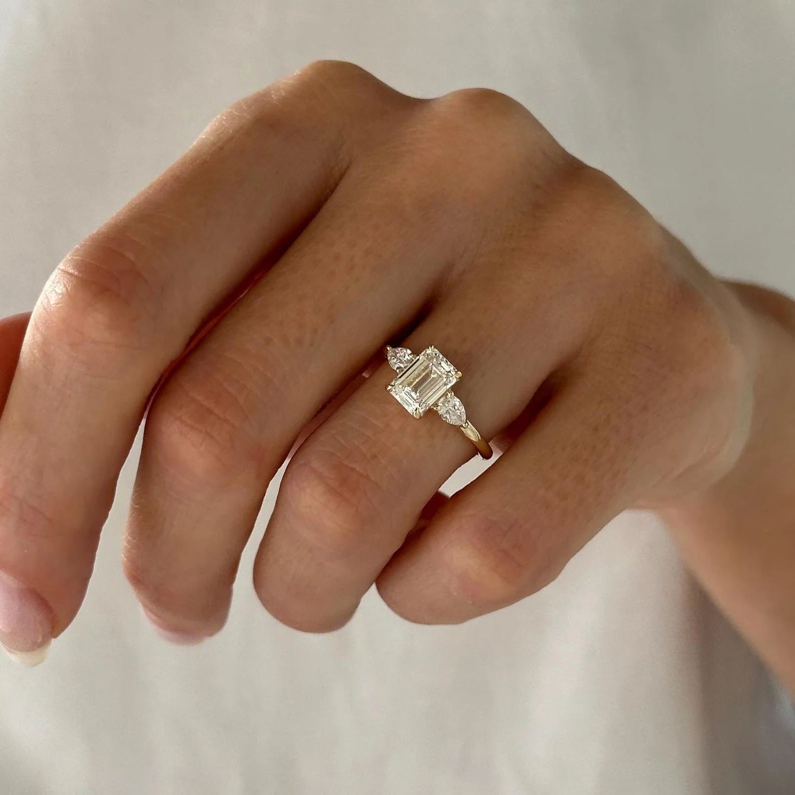 1.5 CT Emerald Three Stone Lab Grown Diamond Engagement Ring preview angle 2