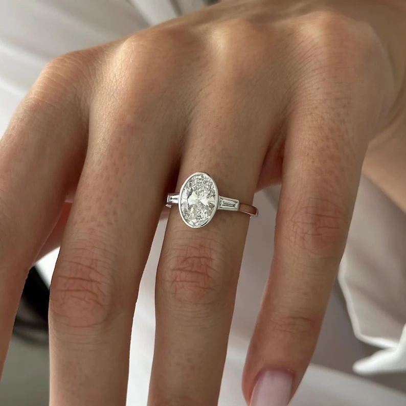 2 CT Oval Bezel and Three Stone Lab Grown Diamond Engagement Ring preview angle 2